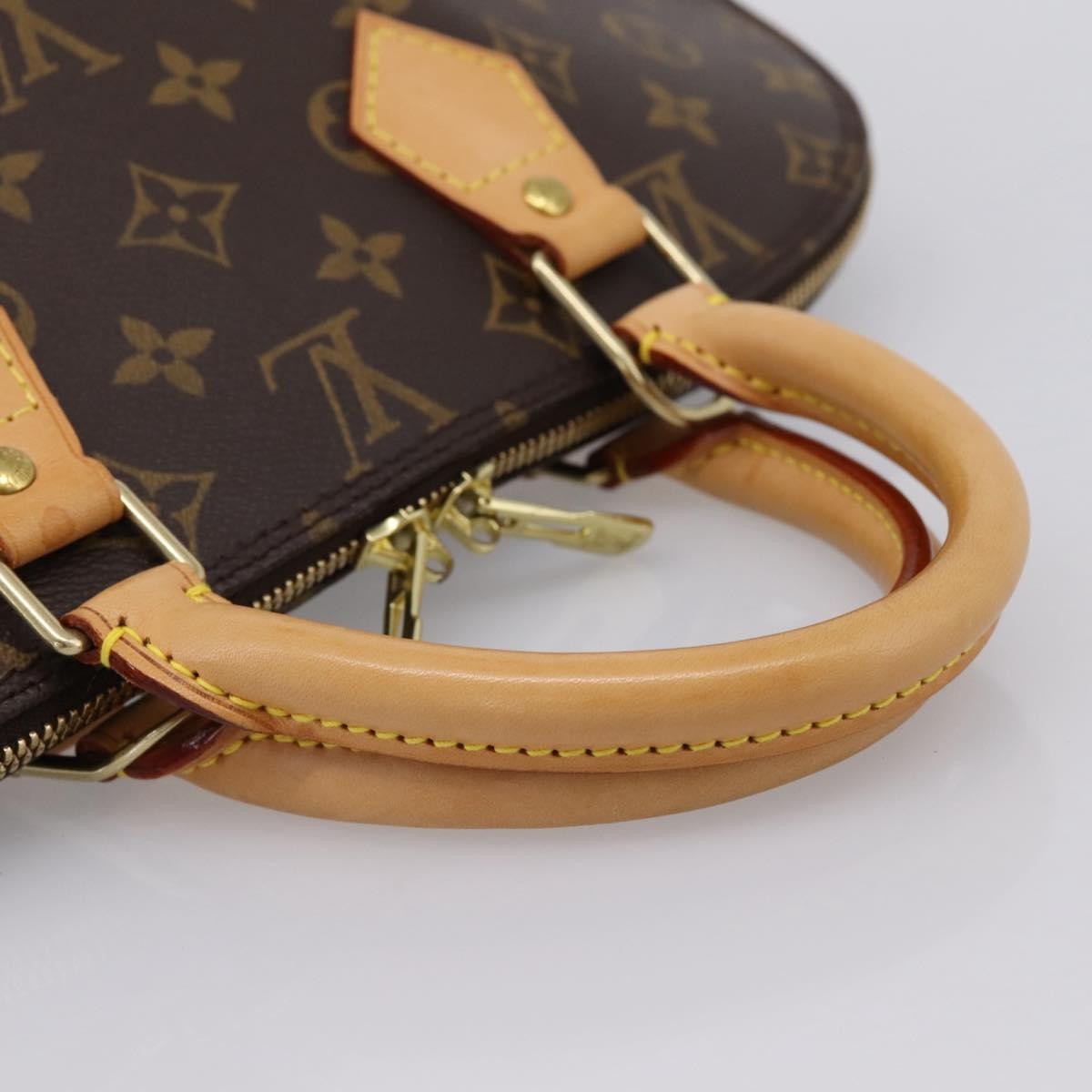 Louis Vuitton Alma Monogram Canvas Brown Canvas Handbag (Pre-Owned)
