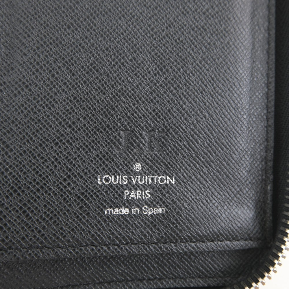 Louis Vuitton Zippy Wallet Vertical Black Leather Wallet (Pre-Owned)