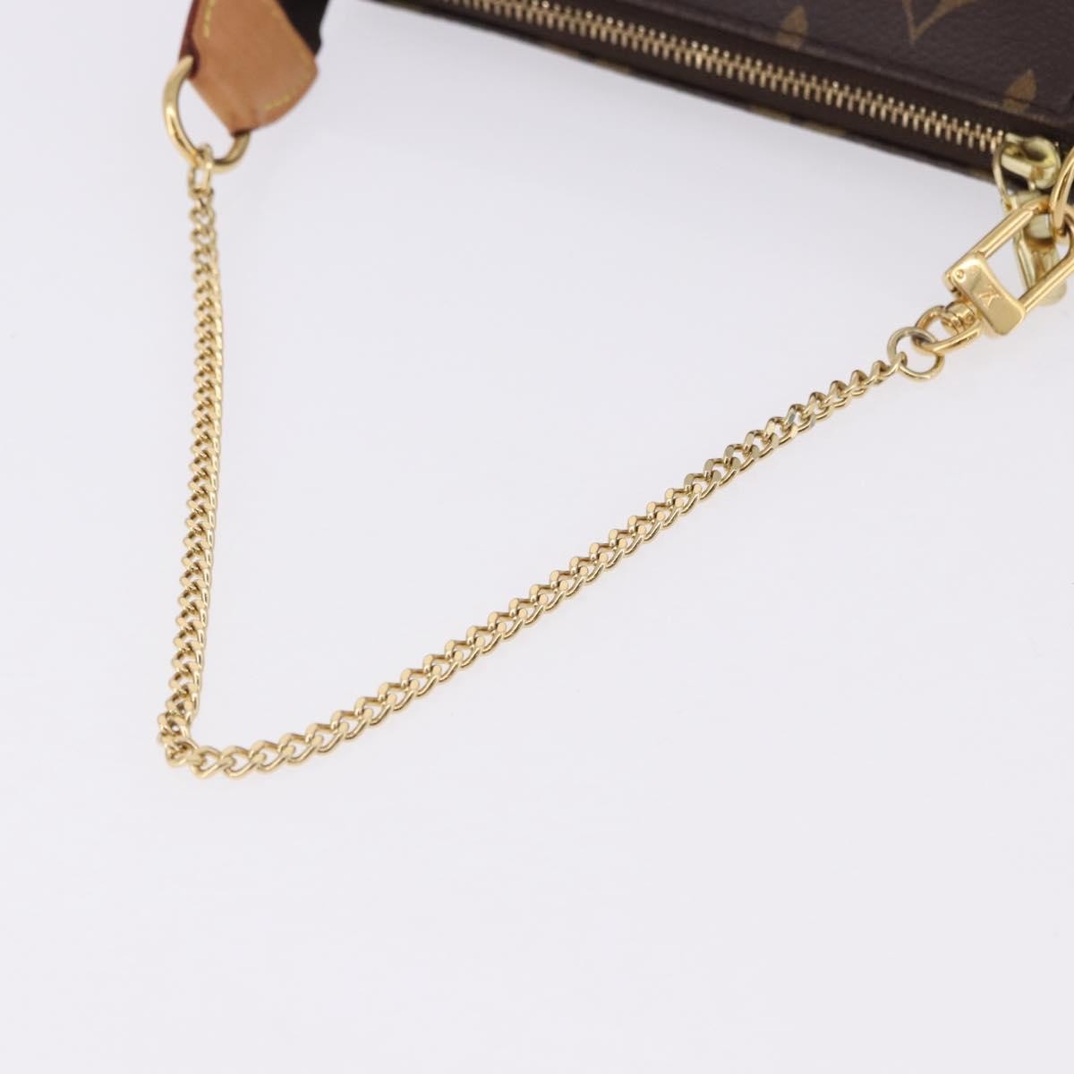 Louis Vuitton Mini Pochette Accessoires Canvas Brown Canvas Clutche & Pouche Bag (Pre-Owned)
