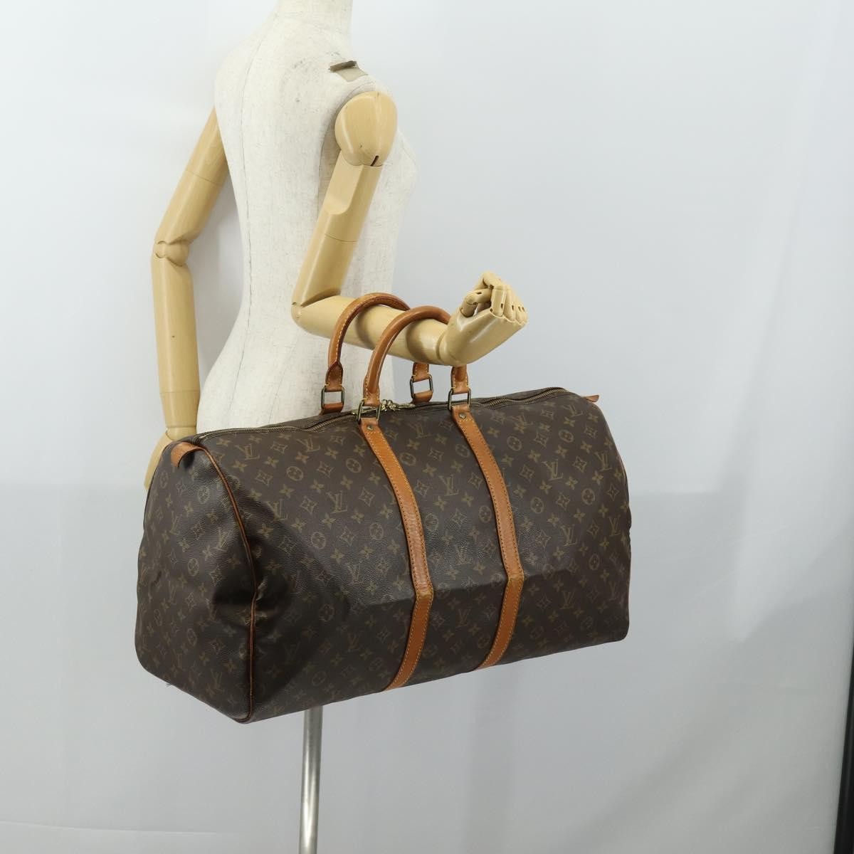 Louis Vuitton Keepall Monogram Canvas Brown Canvas Travel Bag Bag (Pre-Owned)
