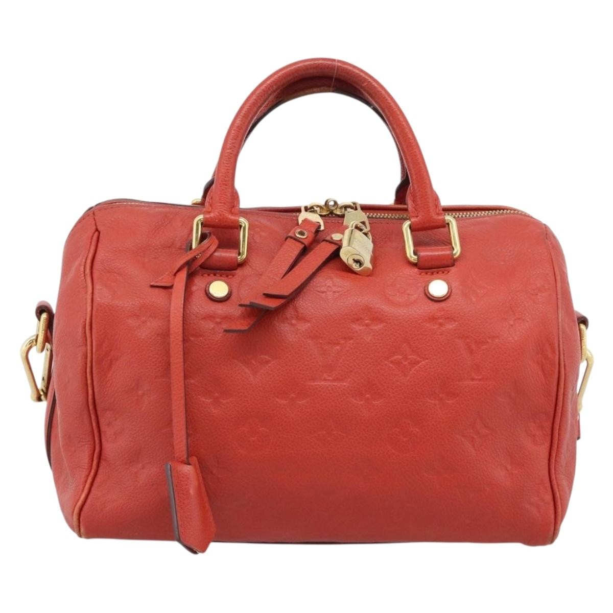 Louis Vuitton Speedy Bandouliere Monogram Empreinte Leather Red Leather Handbag (Pre-Owned)