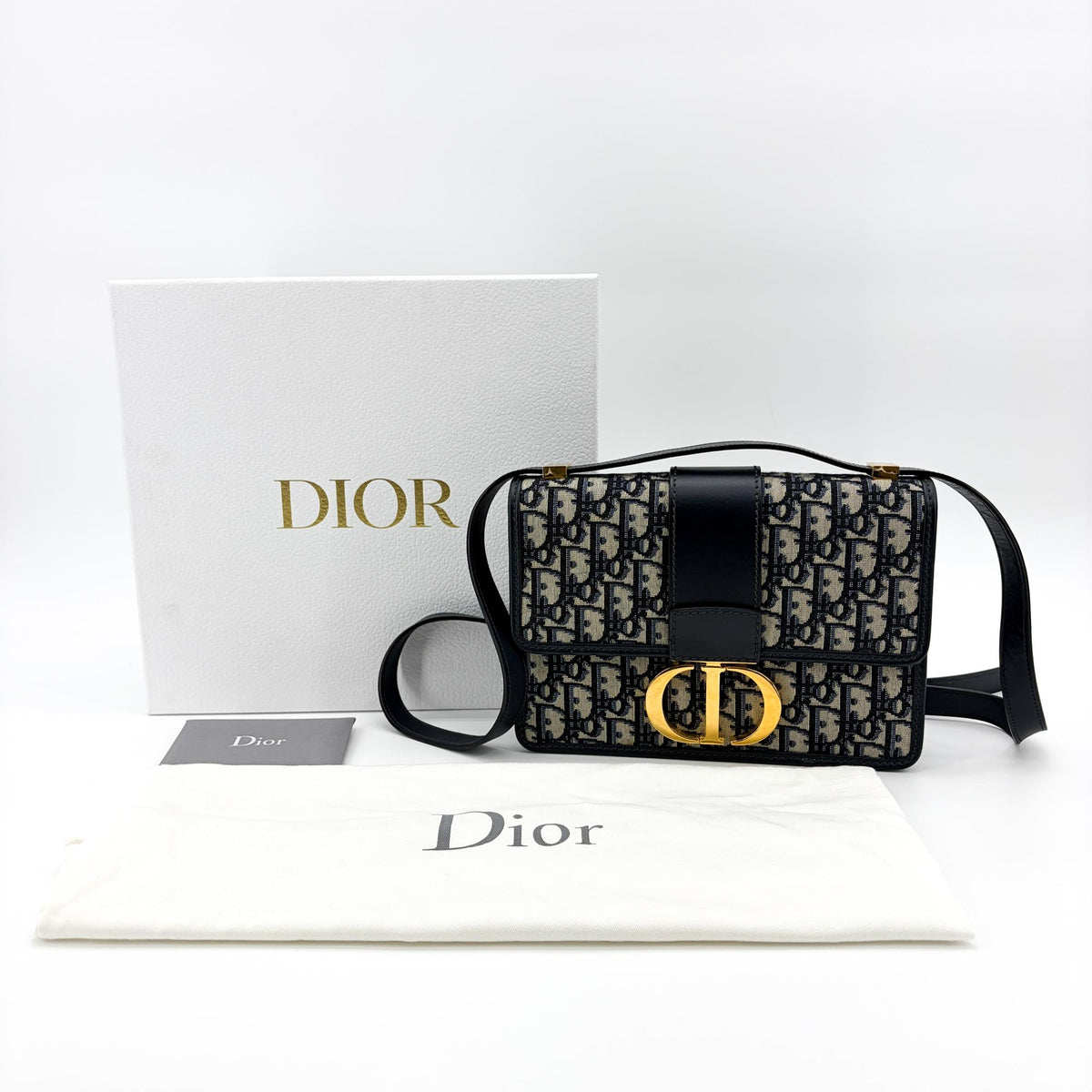 Christian Dior 30 Montaigne Flap Oblique Canvas Navy Canvas Handbag (Pre-Owned)