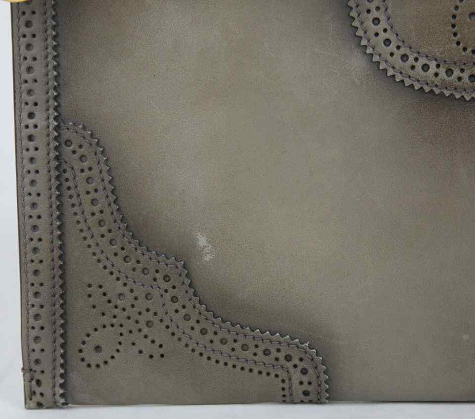Gucci Duilio Brogue Zip Around Leather Clutch Bag (Pre-Owned)