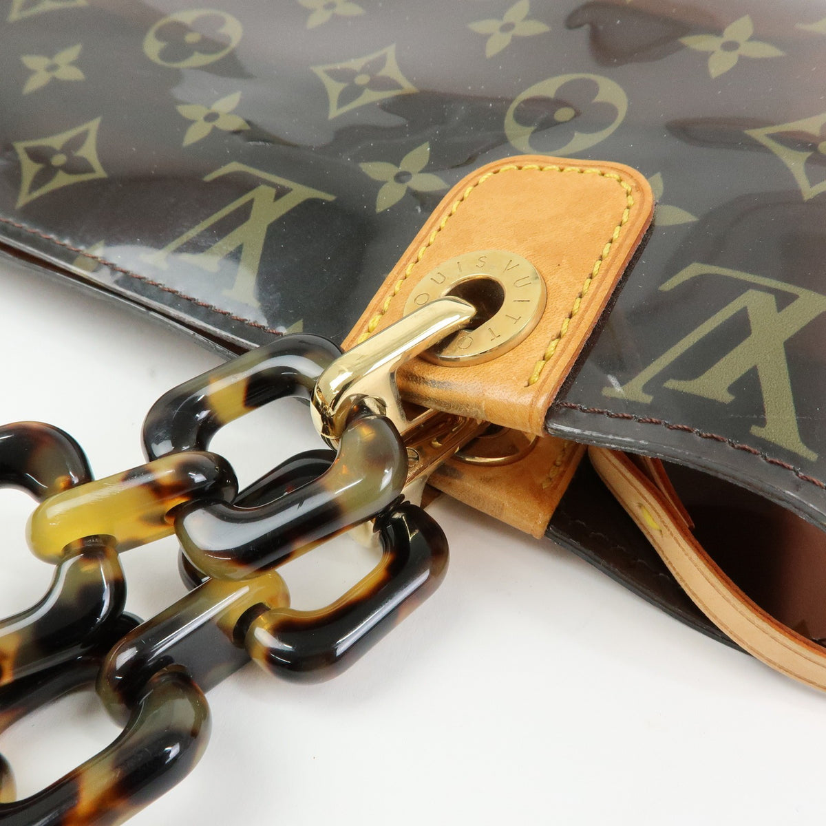 Louis Vuitton Sac Ambre Monogram Vinyl Brown Plastic Handbag (Pre-Owned)