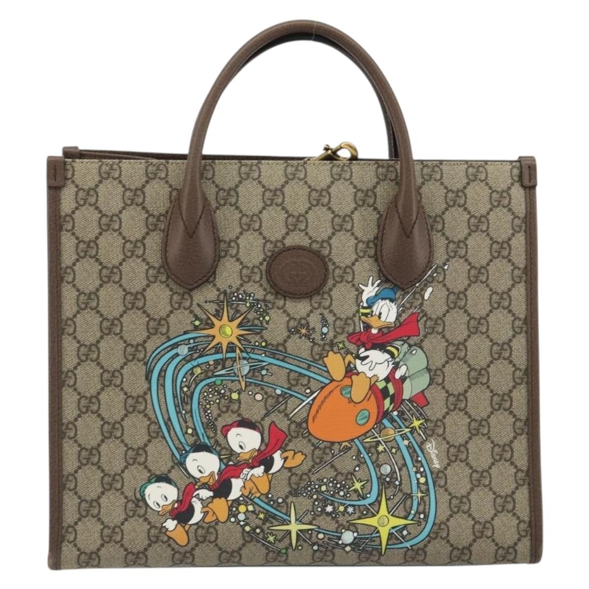 Gucci Disney Donald Duck Convertible Printed Gg Coated Canvas Beige Canvas Tote Bag Bag (Pre-Owned)