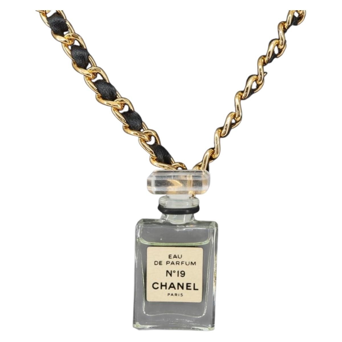 Chanel Cc Perfume Bottle Pendant Chain Long Metal With Leather, Crystals And Faux Pearl Gold Metal Necklace Jewelry (Pre-Owned)