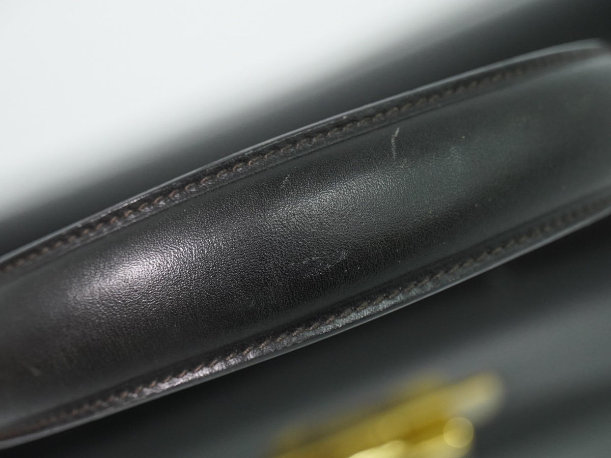 Salvatore Ferragamo Convertible Top Handle Leather Black Leather Handbag (Pre-Owned)
