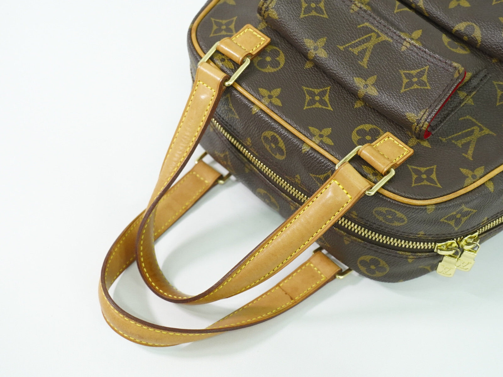 Louis Vuitton Excentri-Cite Monogram Canvas Brown Canvas Handbag (Pre-Owned)