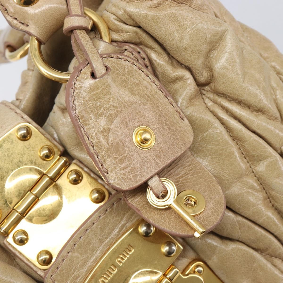 Miu Miu Coffer Convertible Satchel Matelasse Leather Beige Leather Handbag (Pre-Owned)