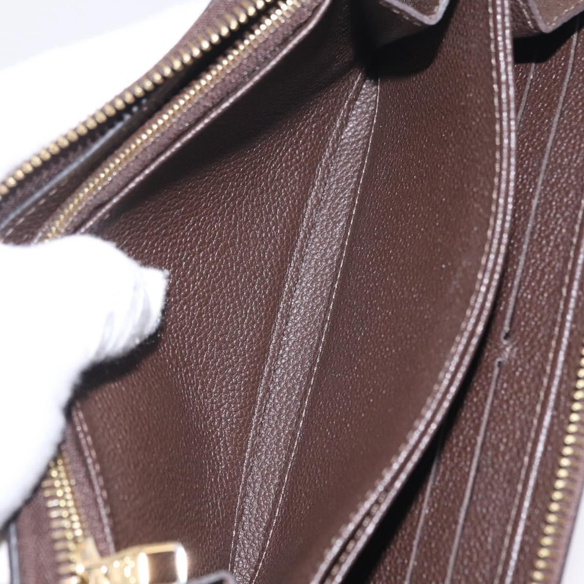 Louis Vuitton Portefeuille Zippy Monogramme Empreinte Monogramme Empreinte Brown Leather Wallets Accessory (Pre-Owned)