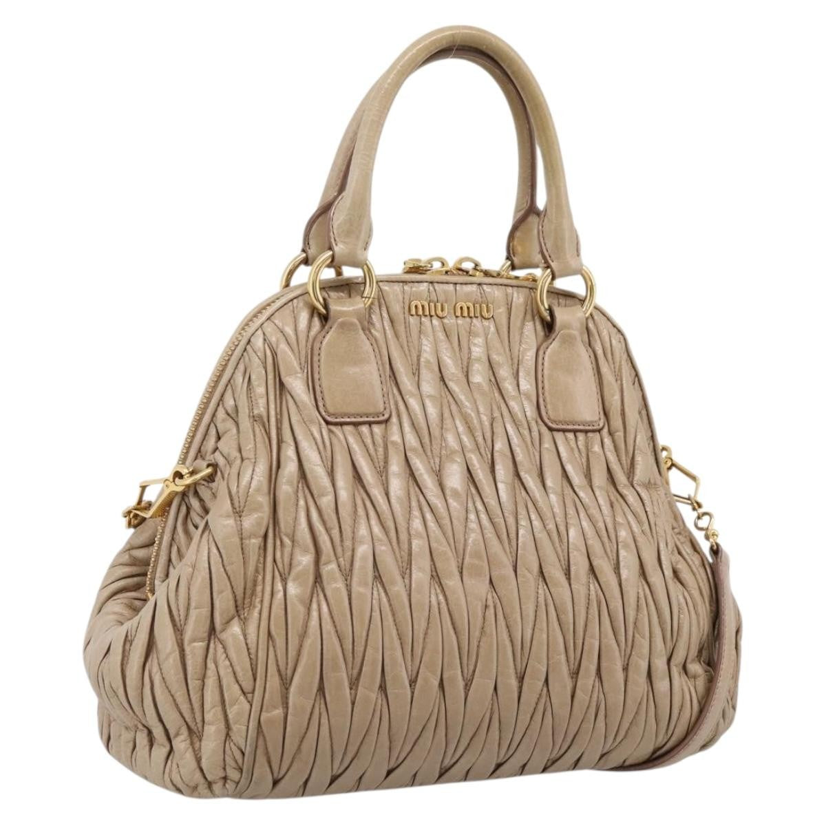 Miu Miu Convertible Dome Satchel Matelasse Leather Beige Leather Handbag (Pre-Owned)
