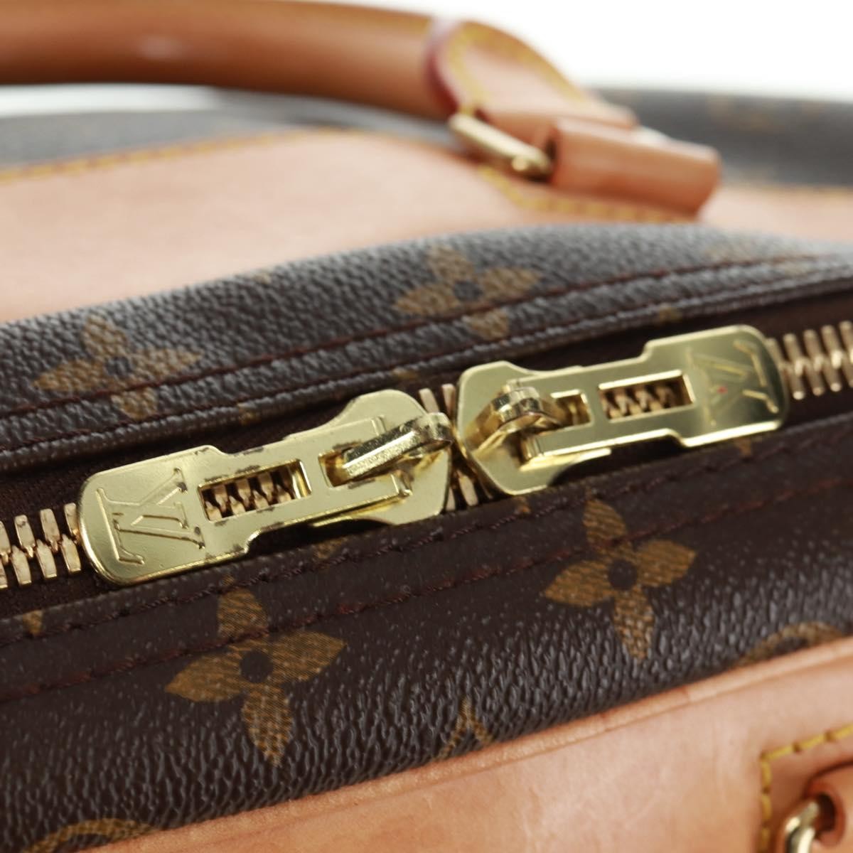 Louis Vuitton Evasion Monogram Canvas Brown Canvas Travel Bag Bag (Pre-Owned)