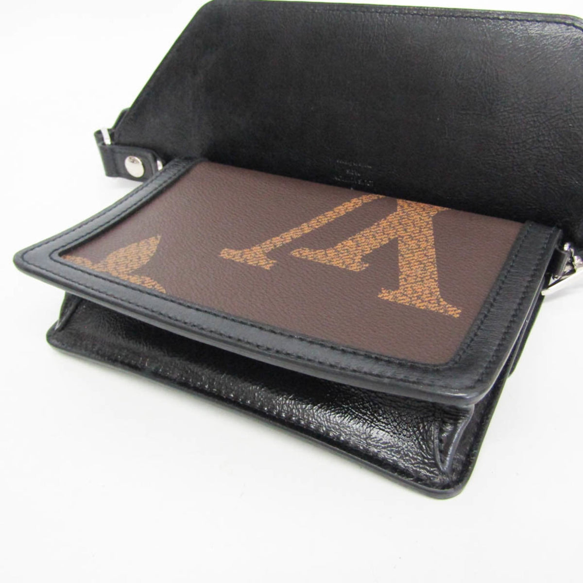 Louis Vuitton Dauphine Bumbag Reverse Monogram Giant Brown Canvas Crossbody Bag Bag (Pre-Owned)