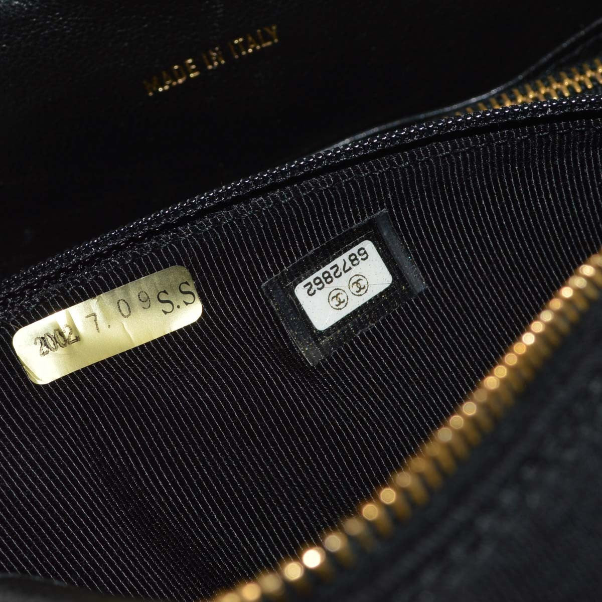 Chanel Vintage Pocket Camera Chevron Jersey Black Canvas Handbag (Pre-Owned)