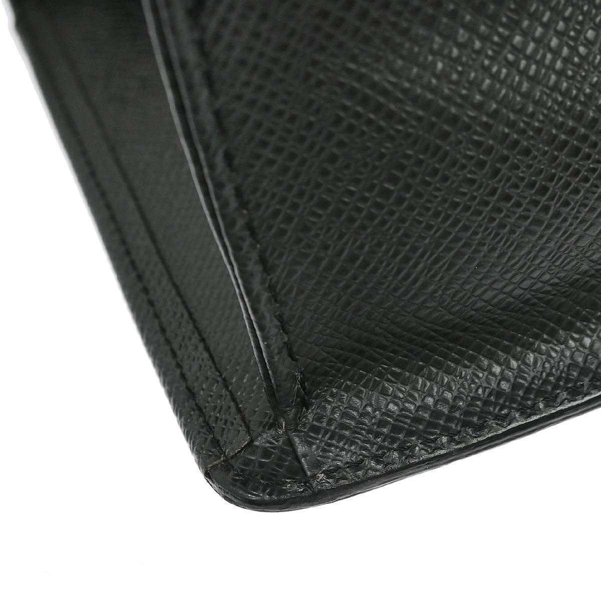 Louis Vuitton Selenga Pochette Taiga Leather Black Leather Clutche & Pouche Bag (Pre-Owned)