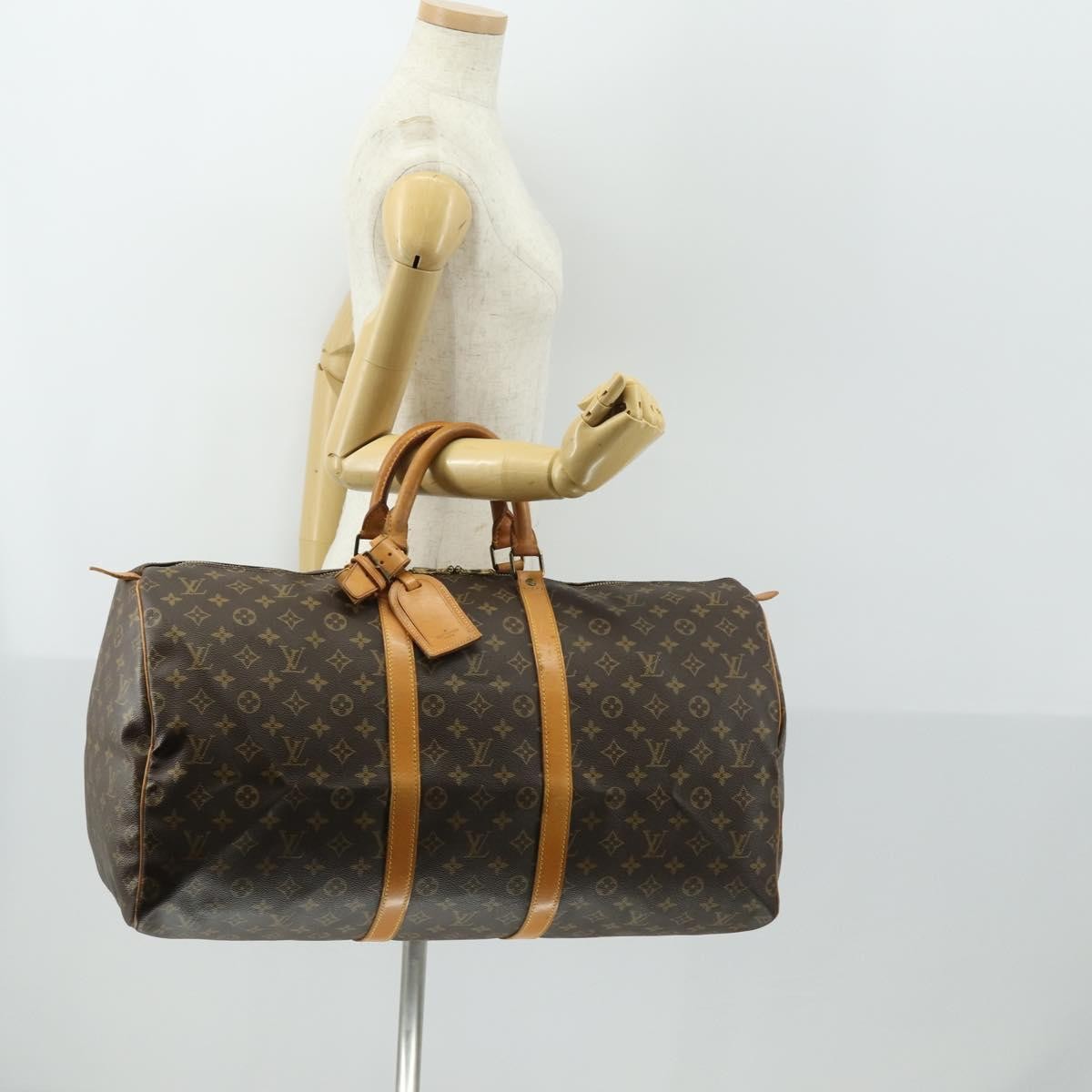Louis Vuitton Keepall Monogram Canvas Brown Canvas Travel Bag Bag (Pre-Owned)
