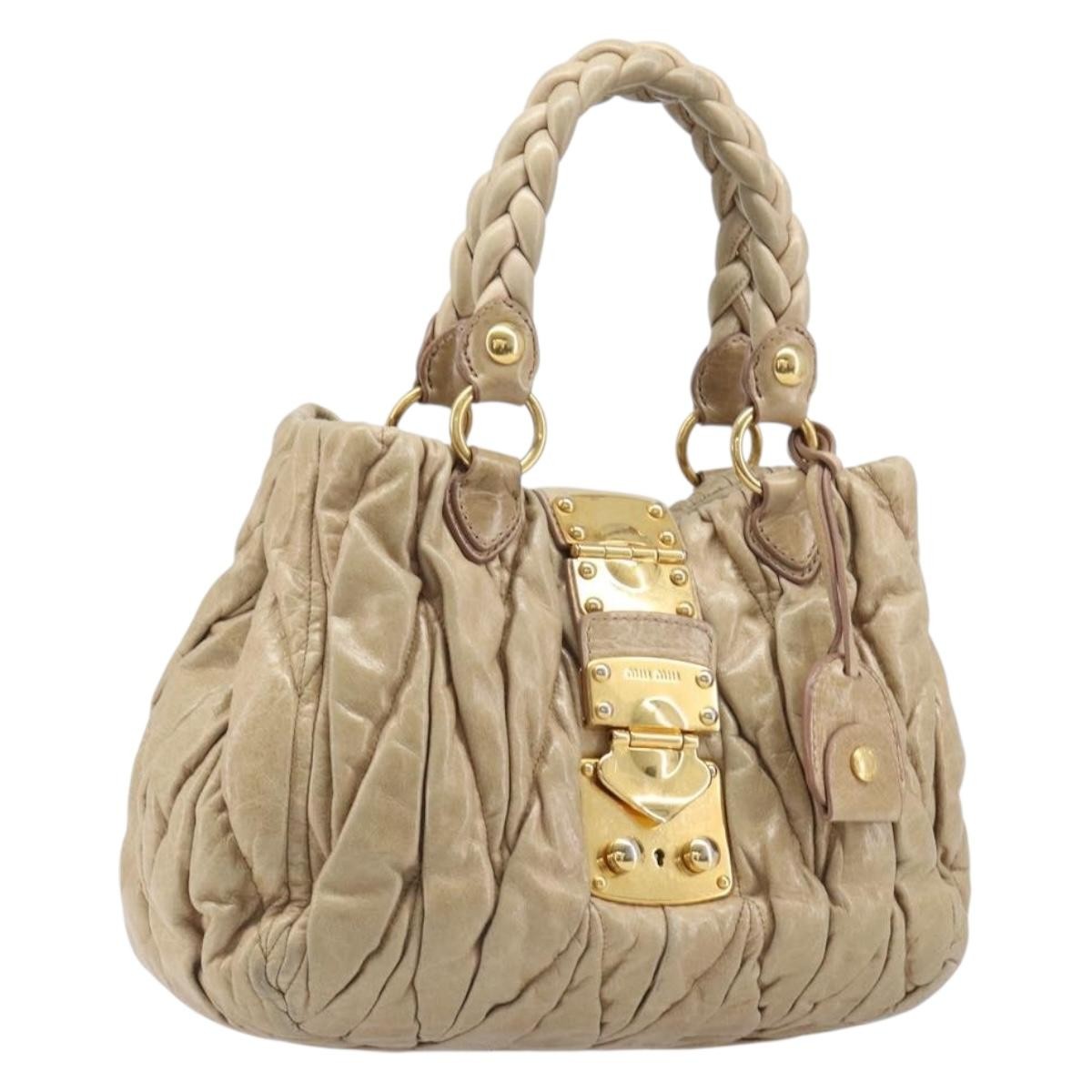Miu Miu Coffer Convertible Satchel Matelasse Leather Beige Leather Handbag (Pre-Owned)