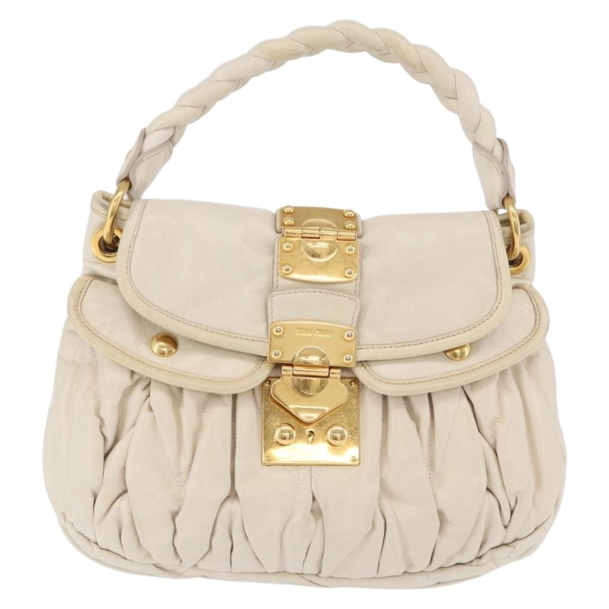 Miu Miu Coffer Hobo Matelasse Leather Beige Leather Handbag (Pre-Owned)