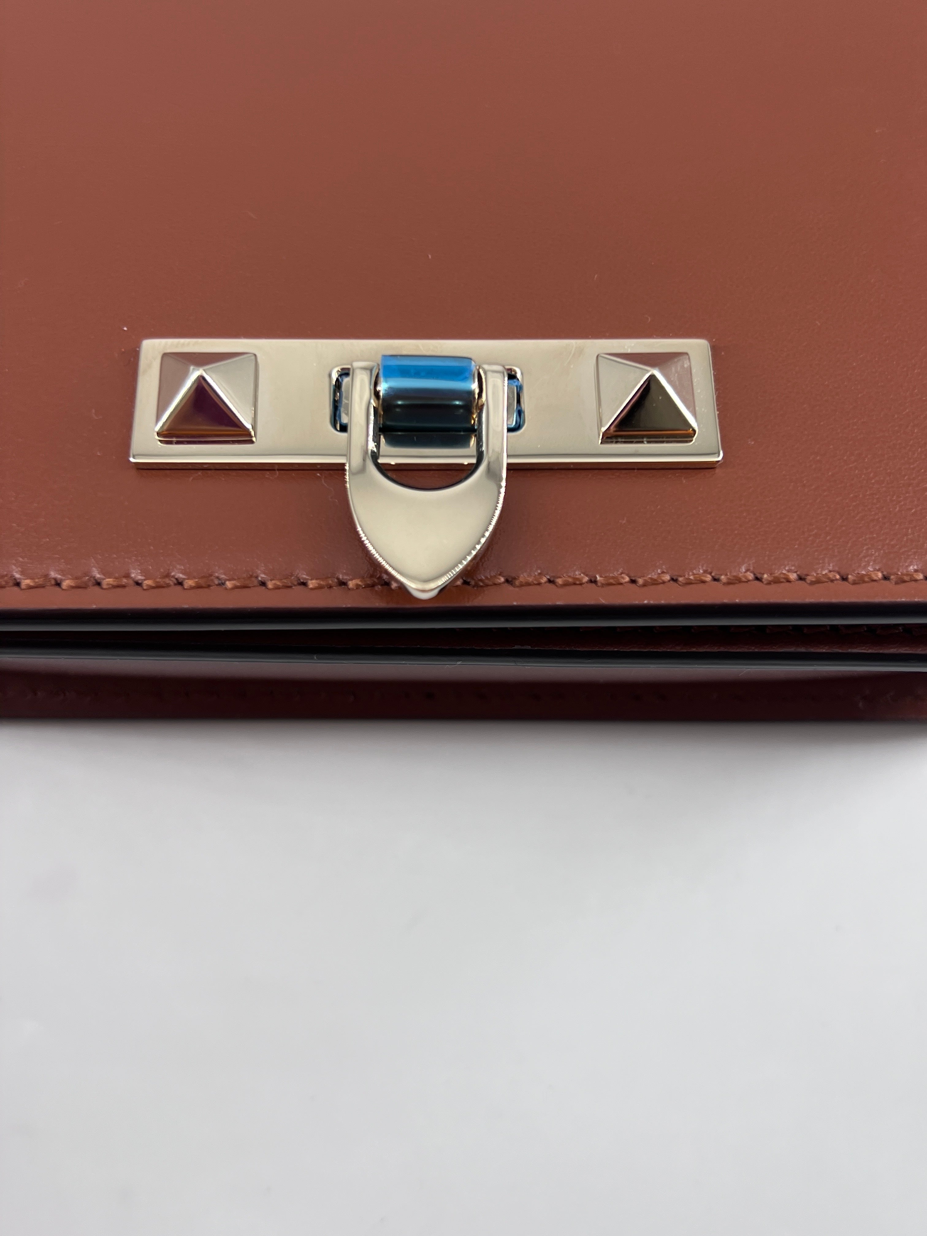 Valentino Garavani Rockstud Flip Lock Flap Bag Leather Brown Leather Bag (Pre-Owned)