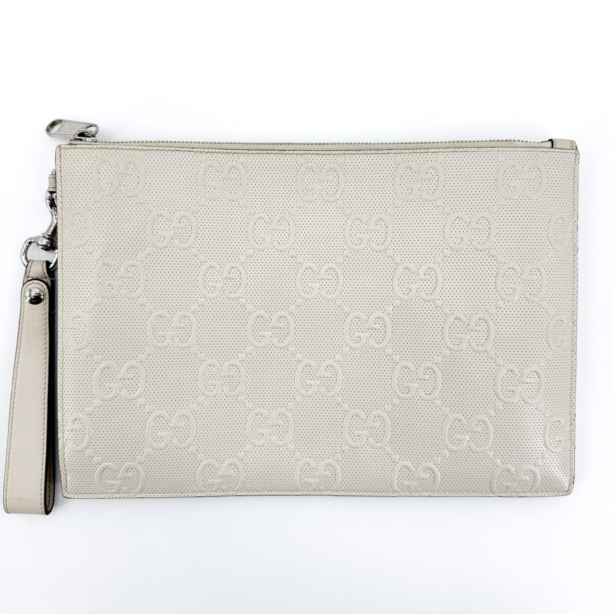 Gucci Wristlet Gg Embossed Perforated Leather White Leather Clutche & Pouche Bag (Pre-Owned)