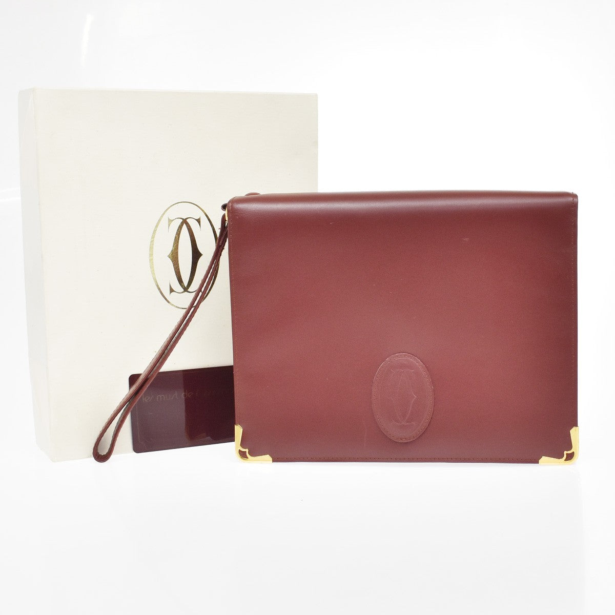 Cartier Must De Cartier Clutch Leather Burgundy Leather Clutche & Pouche Bag (Pre-Owned)