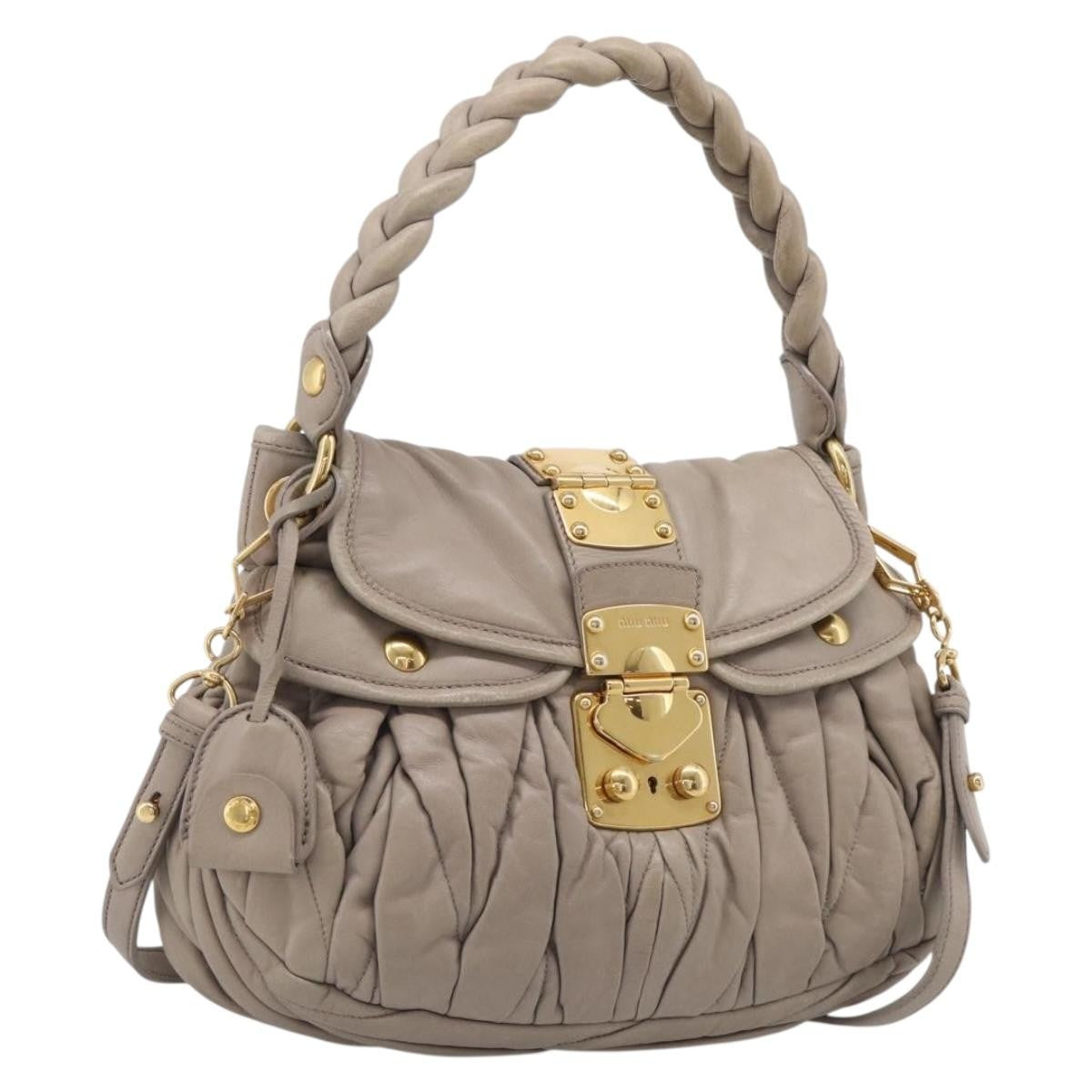 Miu Miu Coffer Hobo Matelasse Leather Beige Leather Handbag (Pre-Owned)