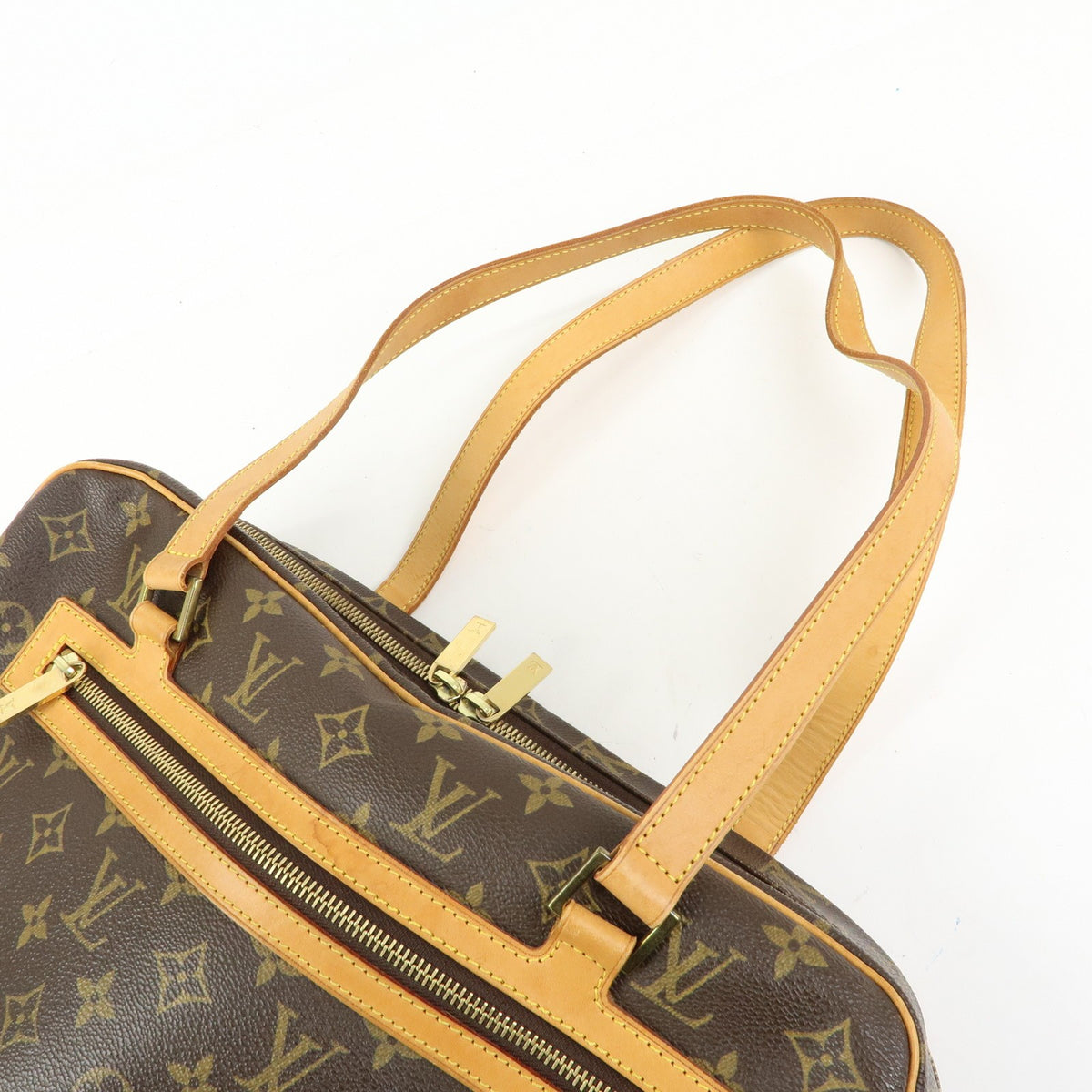 Louis Vuitton Cite Monogram Canvas Brown Canvas Handbag (Pre-Owned)
