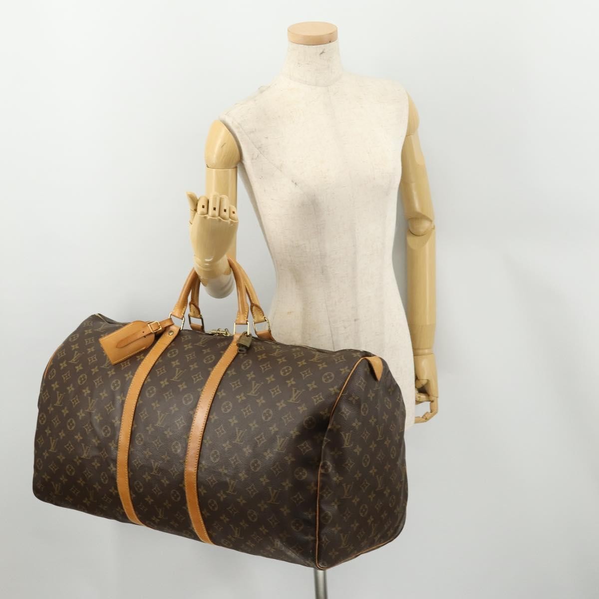 Louis Vuitton Keepall Monogram Canvas Brown Canvas Travel Bag Bag (Pre-Owned)