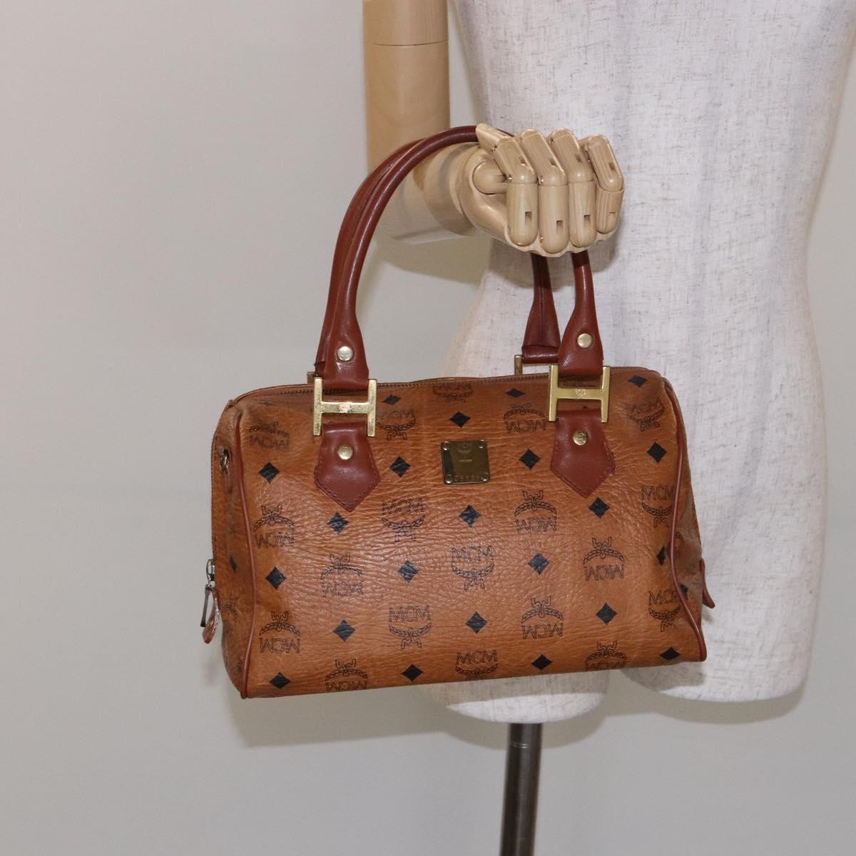 MCM Visetos Logogramme Canvas And Leather Brown Pvc Handbag (Pre-Owned)