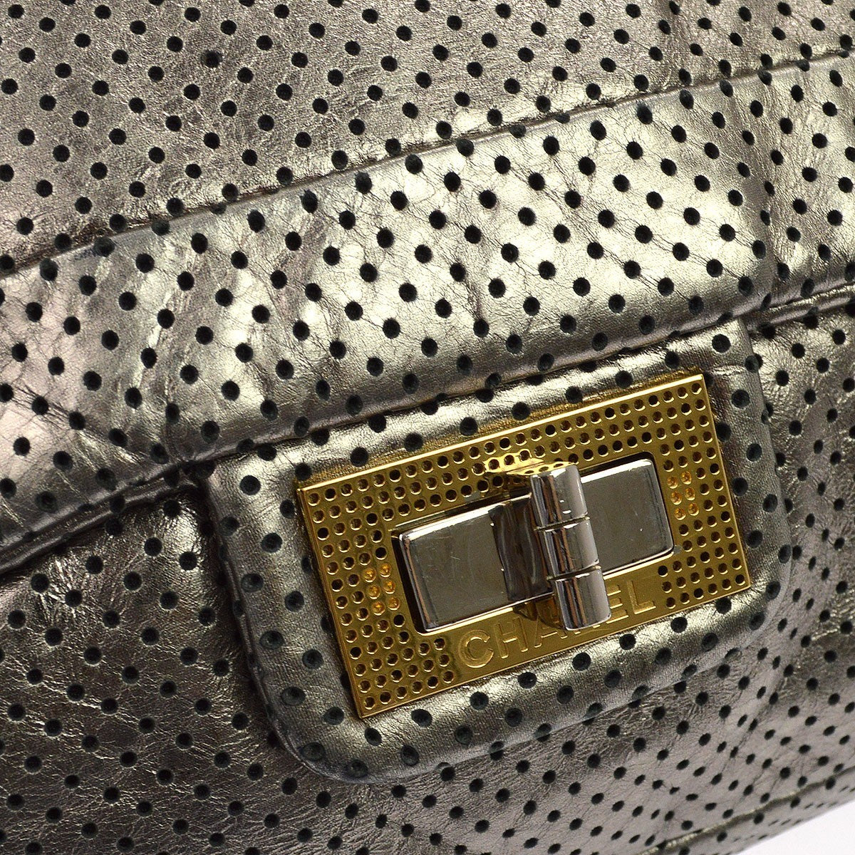Chanel Drill Flap Perforated Leather Metallic Leather Handbag (Pre-Owned)