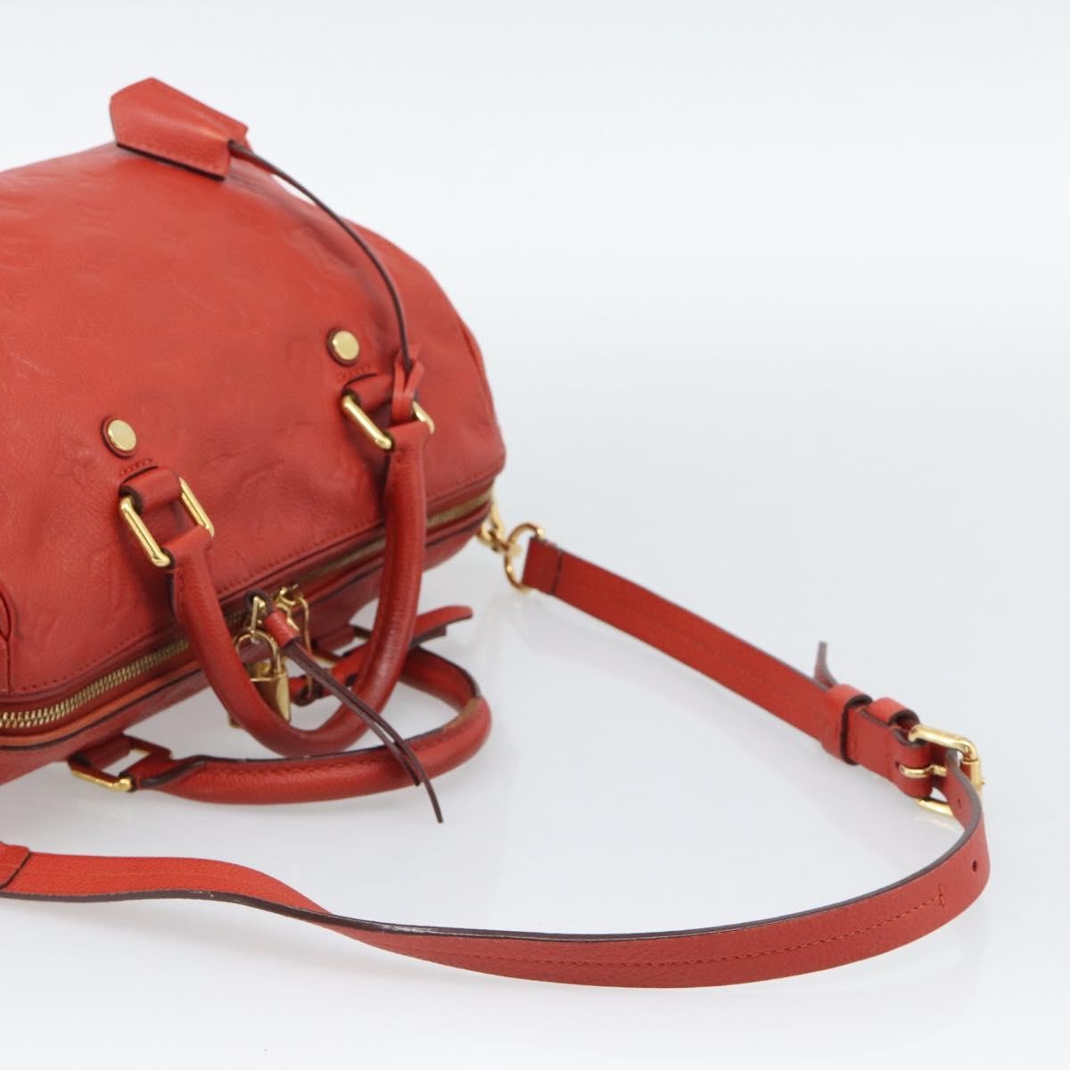 Louis Vuitton Speedy Bandouliere Monogram Empreinte Leather Red Leather Handbag (Pre-Owned)