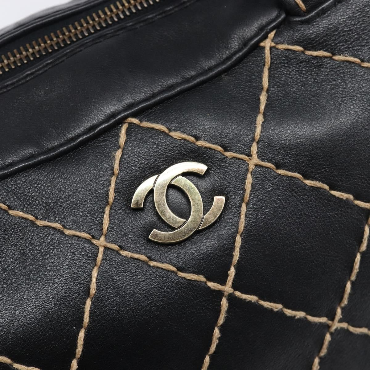 Chanel Surpique Boston Quilted Leather Black Leather Handbag (Pre-Owned)