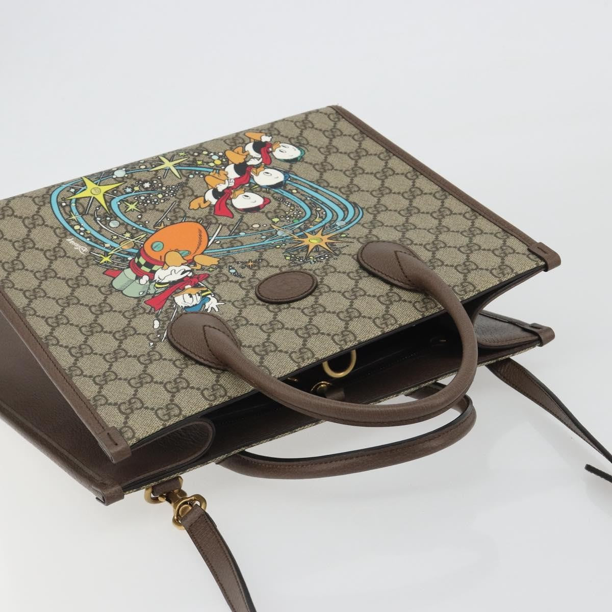 Gucci Disney Donald Duck Convertible Printed Gg Coated Canvas Beige Canvas Tote Bag Bag (Pre-Owned)