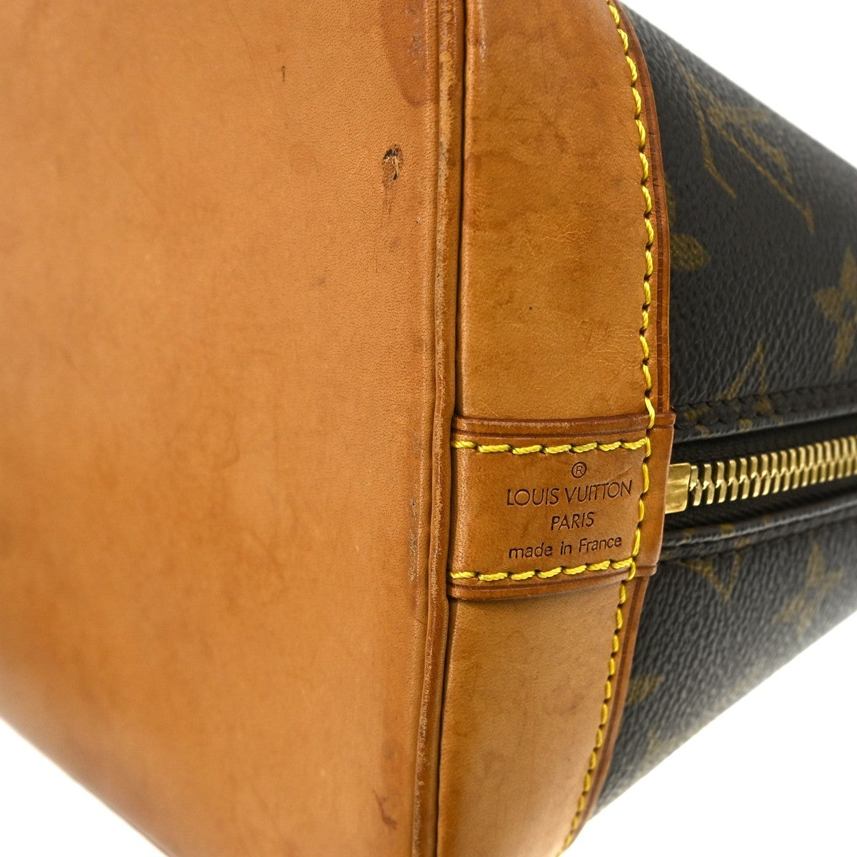 Louis Vuitton Alma Monogram Brown Canvas Handbag (Pre-Owned)