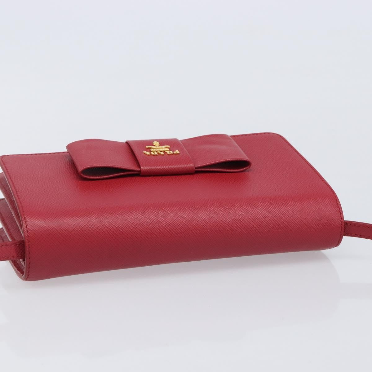 Prada Bow Wallet On Strap Saffiano Leather Red Leather Crossbody Bag Bag (Pre-Owned)