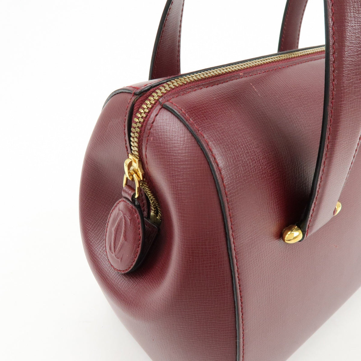 Cartier Must De Cartier Boston Leather Burgundy Leather Travel Bag Bag (Pre-Owned)