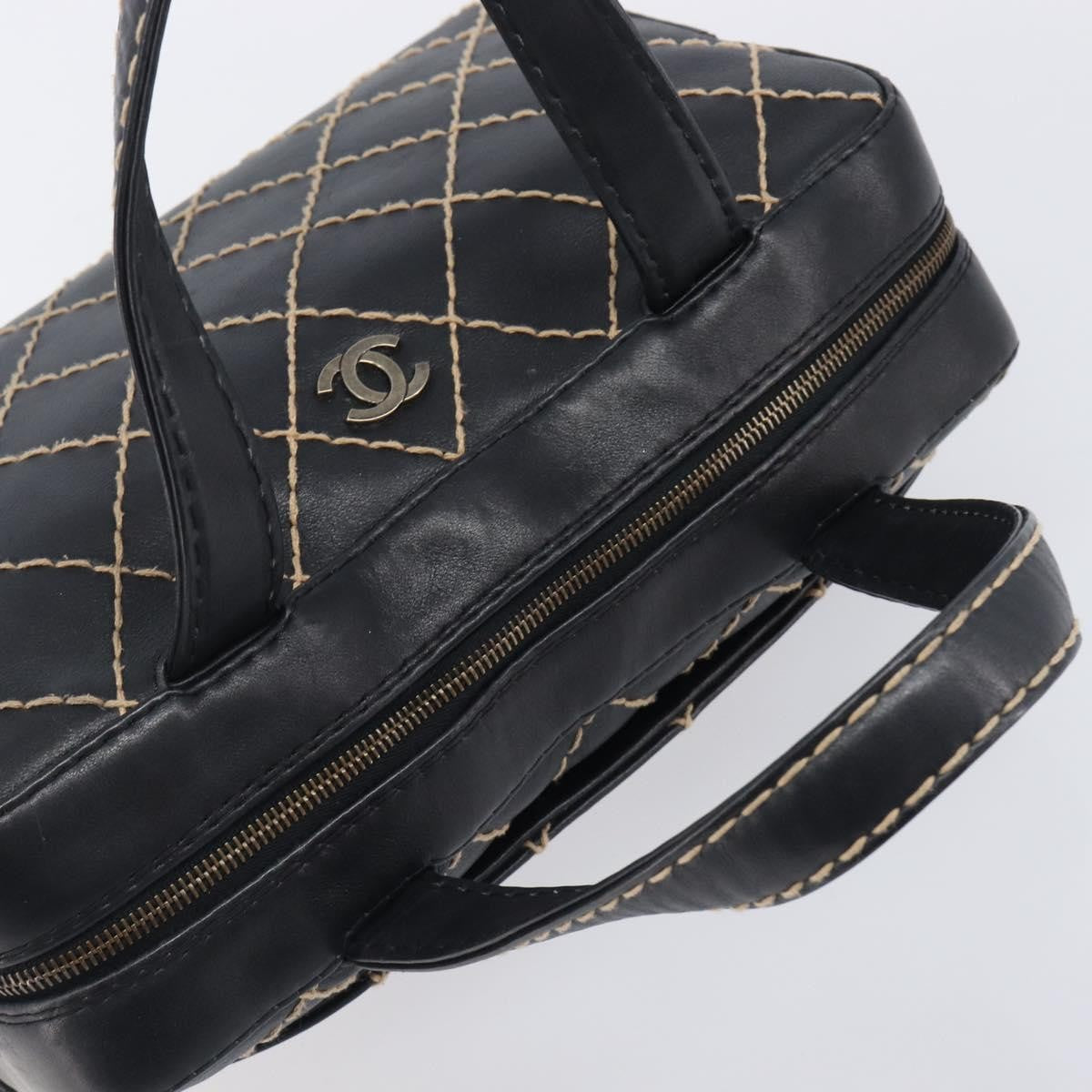 Chanel Surpique Boston Quilted Leather Black Leather Handbag (Pre-Owned)