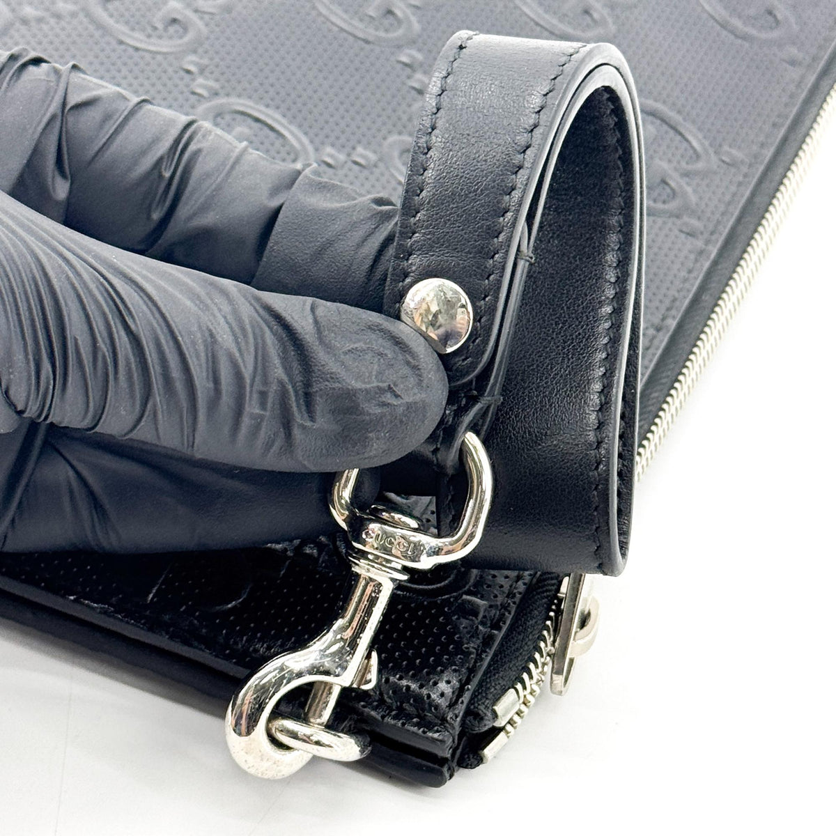 Gucci Wristlet Gg Embossed Perforated Leather Black Leather Clutche & Pouche Bag (Pre-Owned)