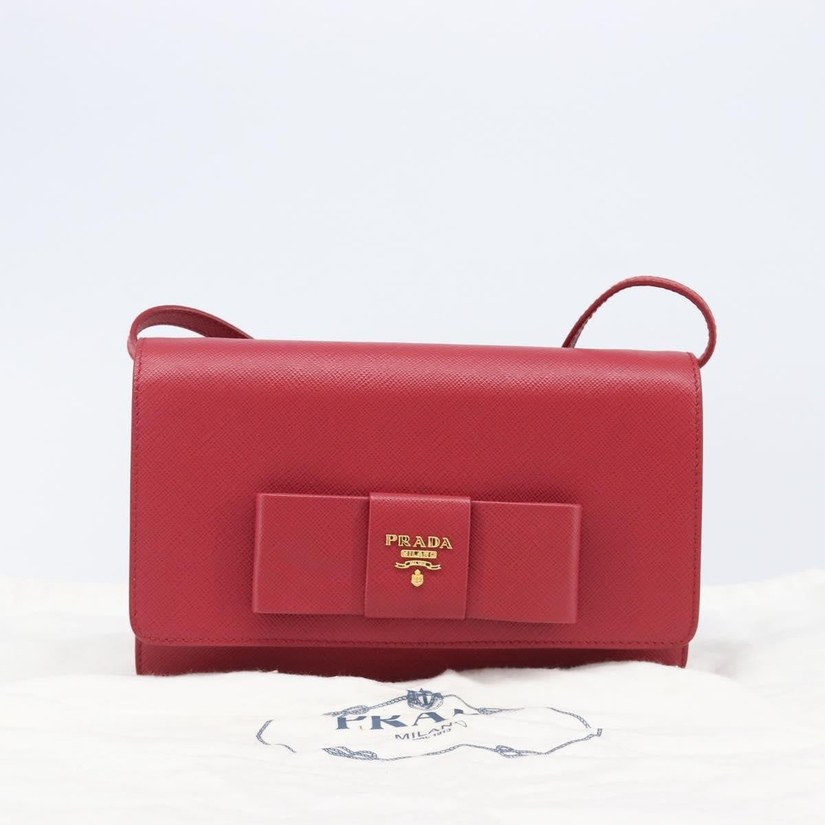 Prada Bow Wallet On Strap Saffiano Leather Red Leather Crossbody Bag Bag (Pre-Owned)