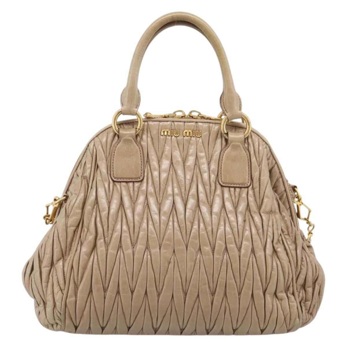 Miu Miu Convertible Dome Satchel Matelasse Leather Beige Leather Handbag (Pre-Owned)