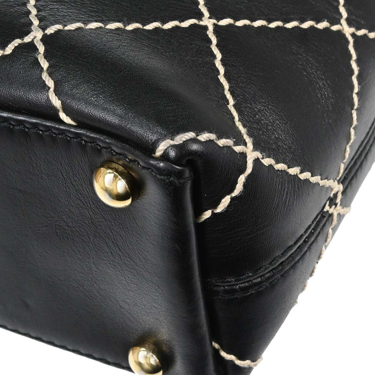 Chanel Surpique Quilted Leather Black Leather Tote Bag Bag (Pre-Owned)