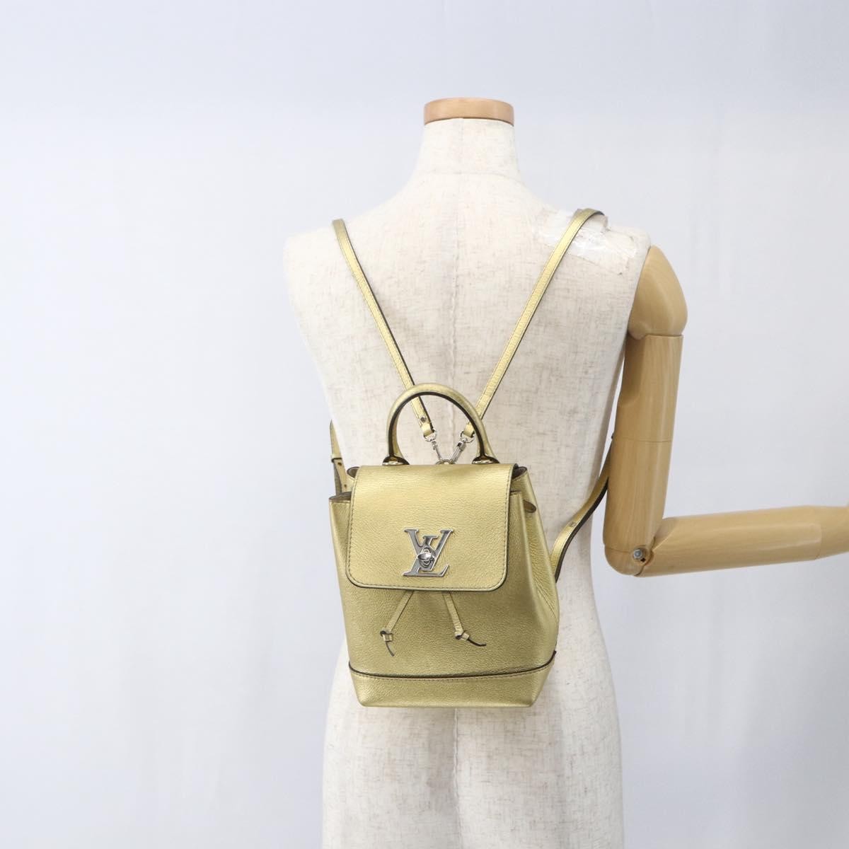 Louis Vuitton Lockme Leather Gold Leather Backpack Bag (Pre-Owned)