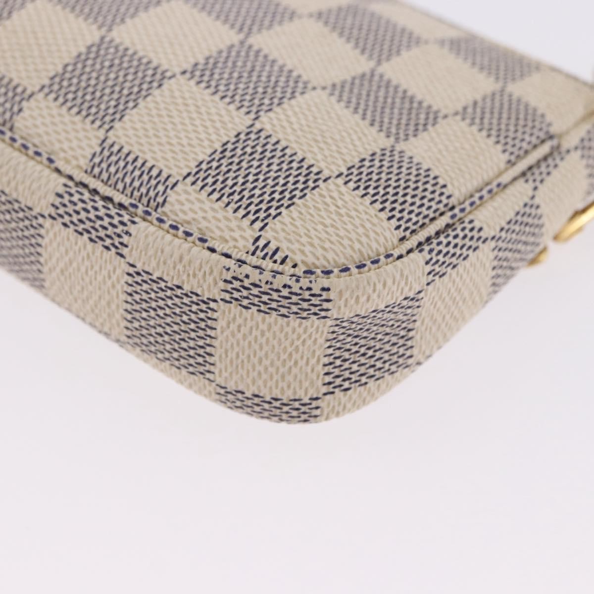 Louis Vuitton Mini Pochette Accessoires Damier Canvas Beige Canvas Clutche & Pouche Bag (Pre-Owned)