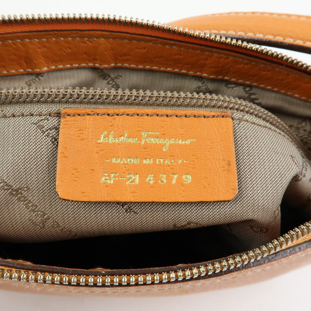 Salvatore Ferragamo Gancini Top Handle Leather Orange Leather Handbag (Pre-Owned)