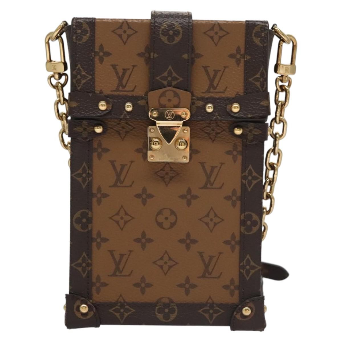 Louis Vuitton Vertical Trunk Pochette Reverse Monogram Canvas Brown Canvas Clutche & Pouche Bag (Pre-Owned)