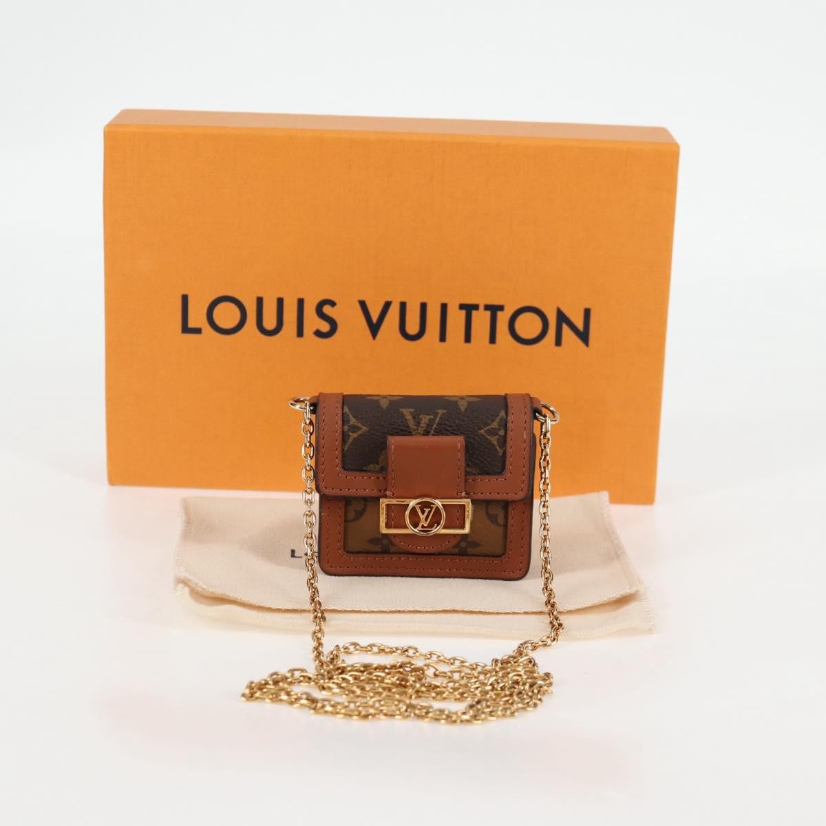 Louis Vuitton Dauphine Reverse Monogram Canvas Brown Canvas Clutche & Pouche Bag (Pre-Owned)