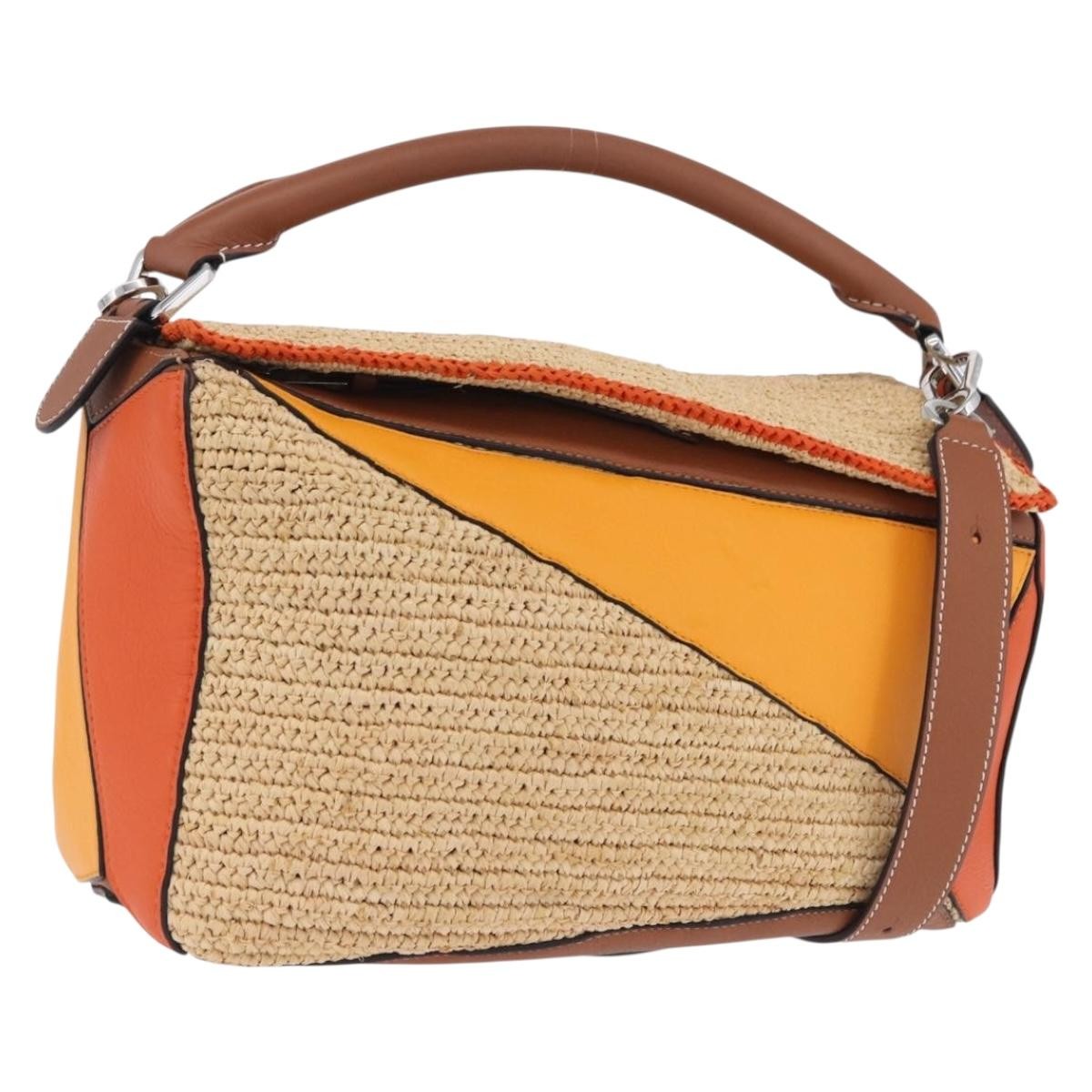 Loewe Puzzle Leather And Raffia Beige Leather Handbag (Pre-Owned)