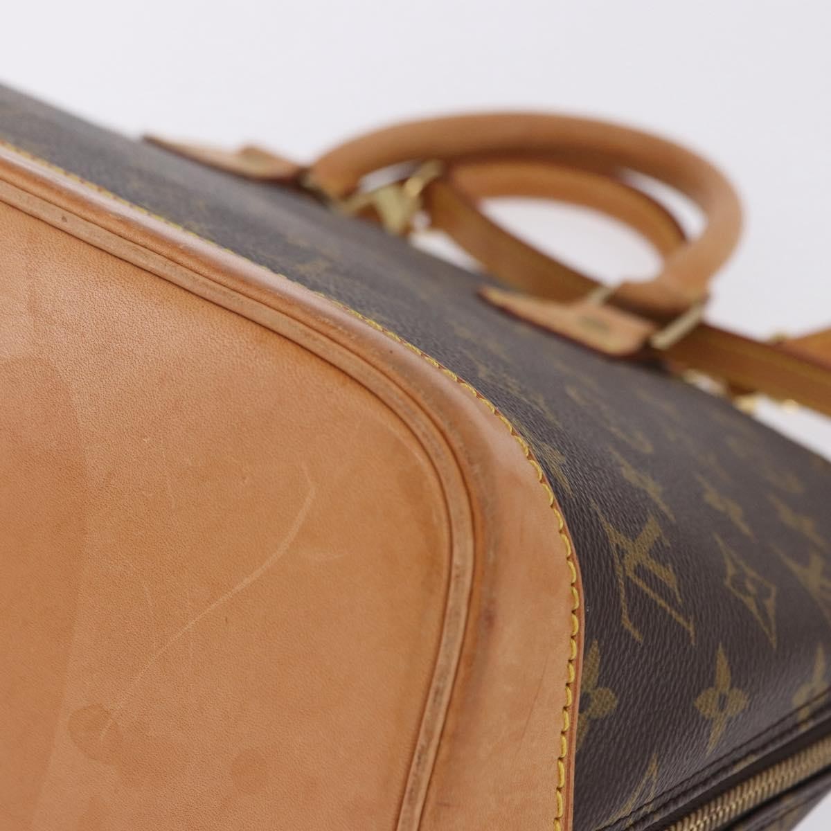Louis Vuitton Alma Monogram Canvas Brown Canvas Handbag (Pre-Owned)