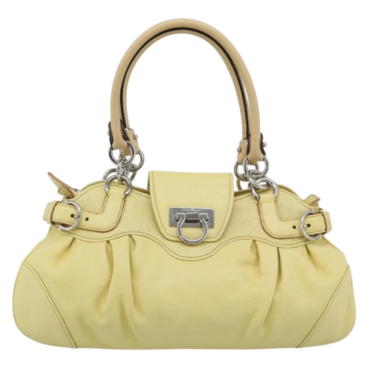 Salvatore Ferragamo Gancini Leather Yellow Leather Handbag (Pre-Owned)