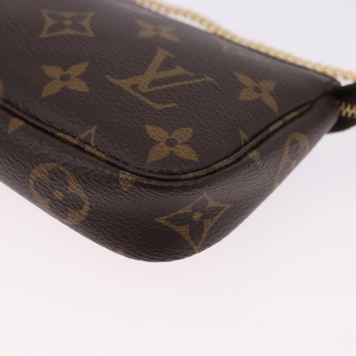 Louis Vuitton Mini Pochette Accessoires Canvas Brown Canvas Clutche & Pouche Bag (Pre-Owned)